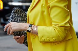 woman wearing cartier watch with smart jacket