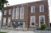 The brick frontage and entrance of Ellesmere Port Library.