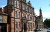 The red-brick and stone frontage of Grosvenor Museum in Chester.