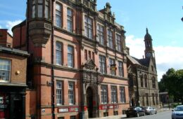 The red-brick and stone frontage of Grosvenor Museum in Chester.