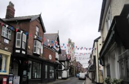 Buildings and bunting along King Street in Knutsford