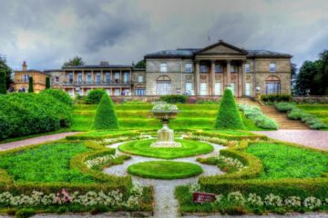 Tatton Hall seen across the formal gardens in an archive photograph